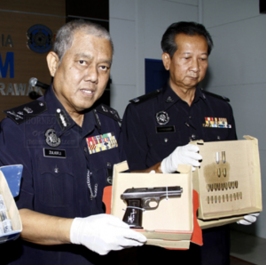 Automatic pistol and live ammunition shown to the public 