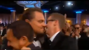 A hug for 'Riz and Joey' of Red Granite Pictures as Di Caprio makes his way to accept the Golden Globe for best actor