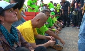 Point of arrest - Natalie is approached by police for 'illegally' protesting against Lynas's controversial plant
