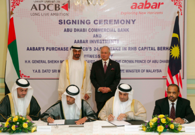 Khadem signs Aabar's purchase of RHB bank share