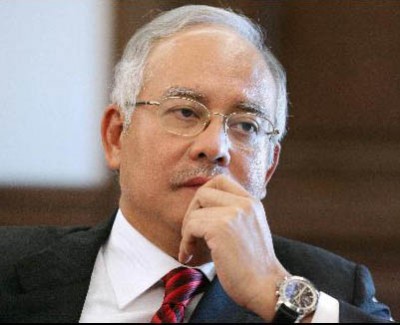 Making tough decisions or just running away? PM Najib Razak