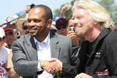 Mohamed al-Husseiny signing Aabar's ill-fated Galactic space travel deal with Richard Branson