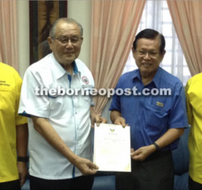 Temenggong Lee (left) received his extension from SUPP Vice President just before the murder