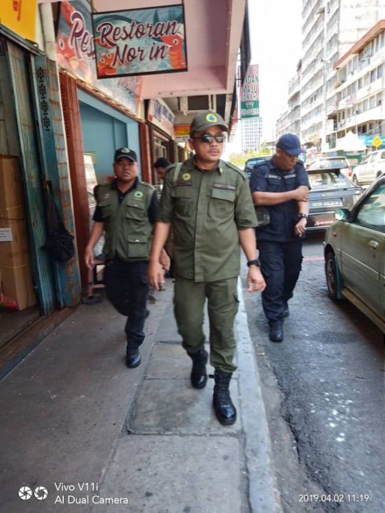 Officers raid the street corner sellers the day after we reported the incident